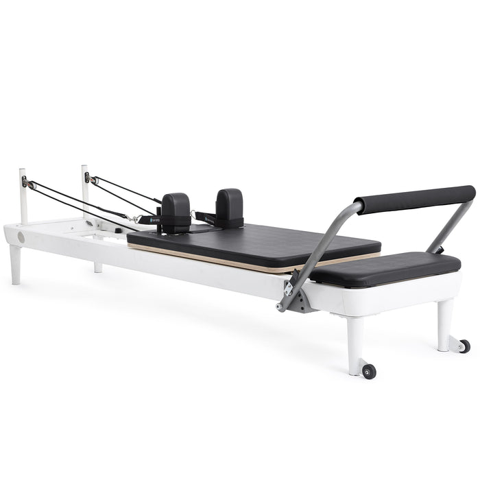 Elina Pilates Nubium Reformer Bundle with a white aluminium frame and black upholstery, angled view