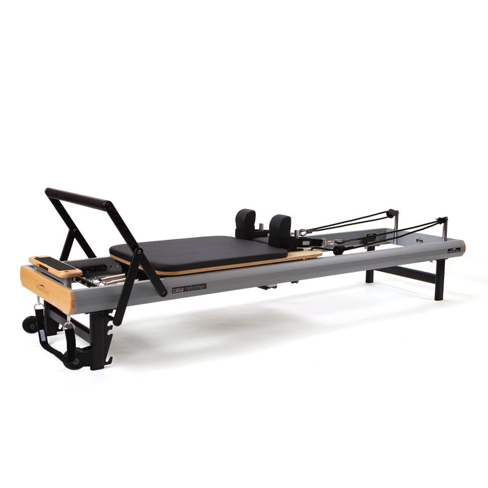 Peak Pilates casa Reformer with Long/Short Box, an aluminium home reformer on integrated transport wheels