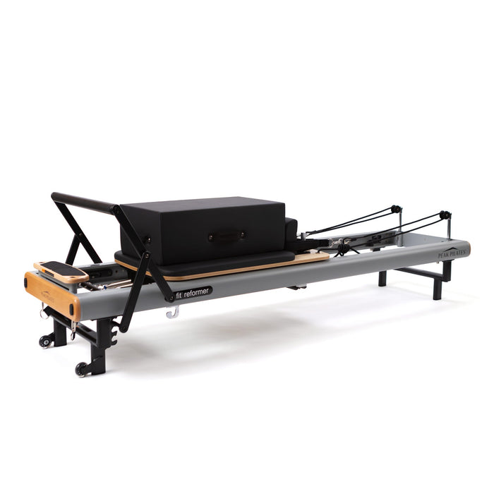 Peak Pilates fit Reformer with its long/short box, a powder-coated aluminium studio reformer