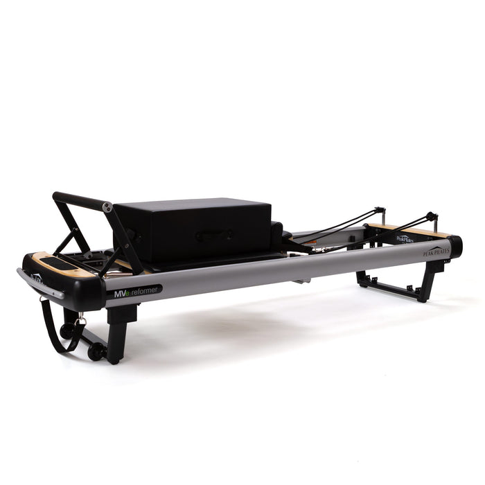 Peak Pilates MVe Reformer with Long/Short Box, a powder-coated aluminium reformer with black upholstery