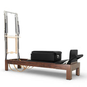 Classic Dark Wood Reformer with Tower, walnut frame, black upholstery
