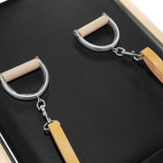 D-ring handles with wooden grips and tan leather straps, black pad