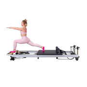 Align Pilates A8-Pro, instructor in a standing lunge on the reformer