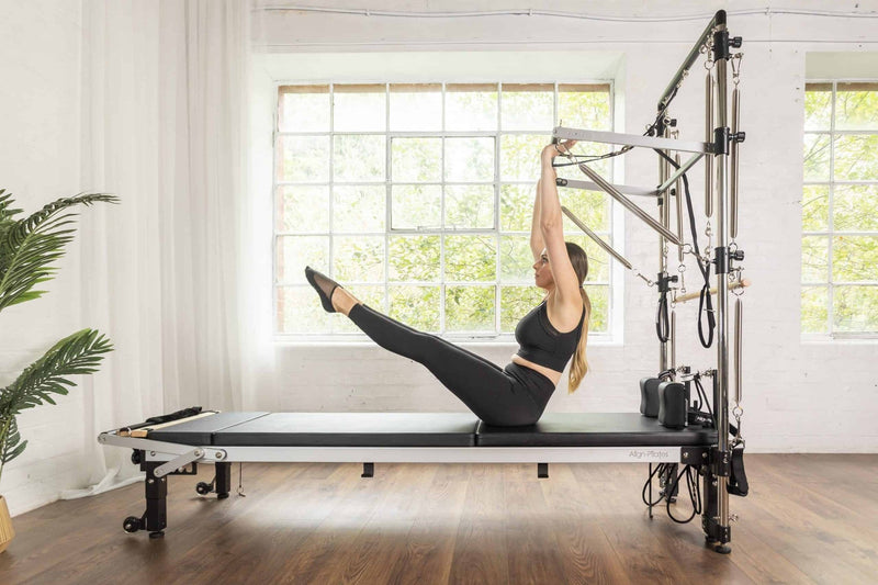 Align Pilates C8-Pro with Half Cadillac, teaser exercise in a bright studio