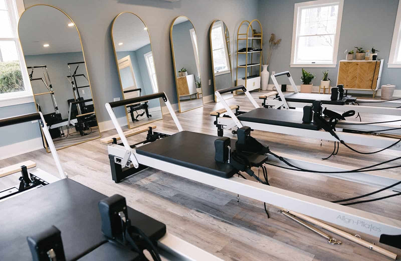 Align Pilates C8-Pro Reformer, row of reformers in a studio