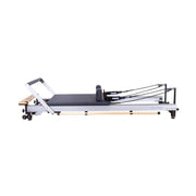 Align Pilates C8-Pro Reformer, three quarter view on standard legs
