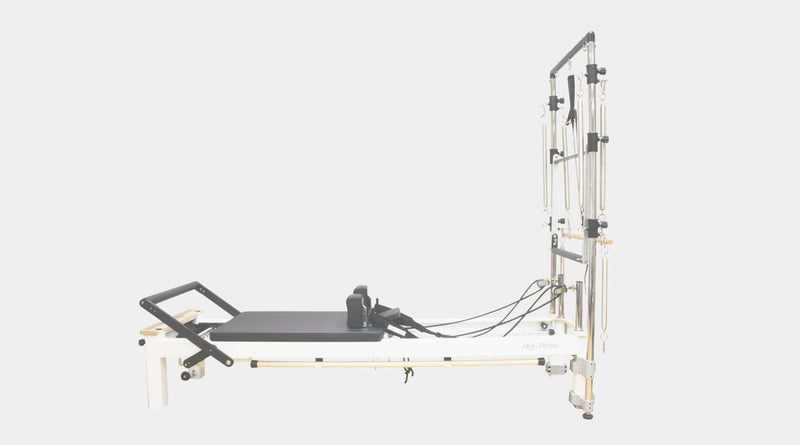 Align Pilates C8-S with Half Cadillac, side view on a light grey background