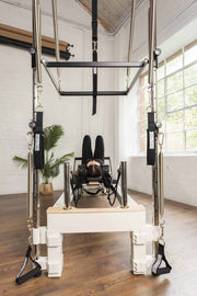 Align Pilates C8-S with Half Cadillac, view from the head end looking through the tower