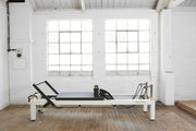 Align Pilates C8-S Pro, white reformer in a bright studio