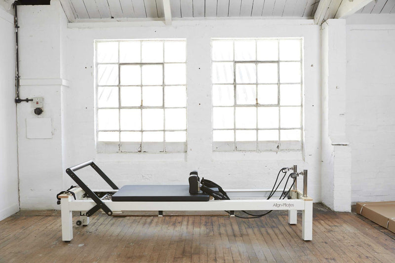 Align Pilates C8-S Pro, white reformer in a bright studio