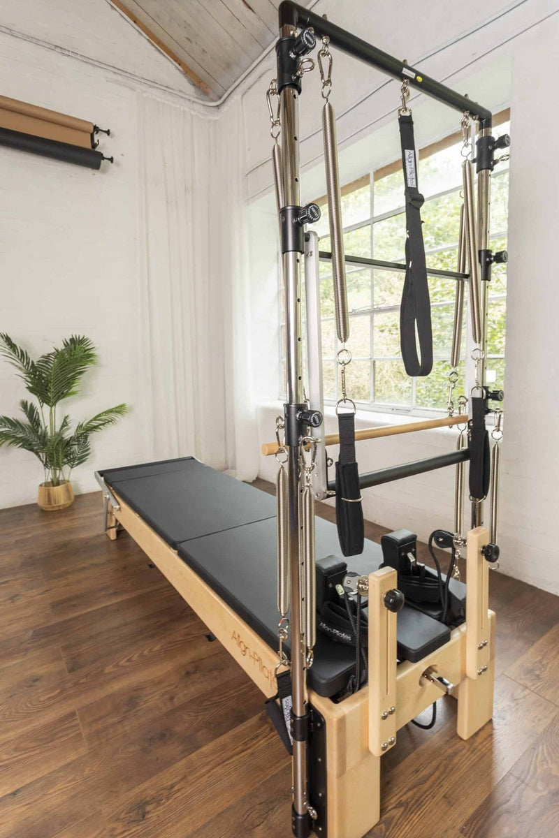 Align Pilates M8-Pro with Half Cadillac, view along the reformer from the tower end