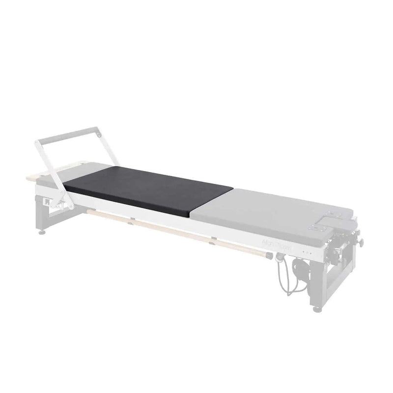 Align Pilates Mat Converter for A Series, converter highlighted on a faded reformer