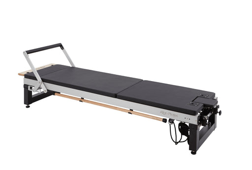 Align Pilates Mat Converter for A Series, fitted to a black reformer on a white background