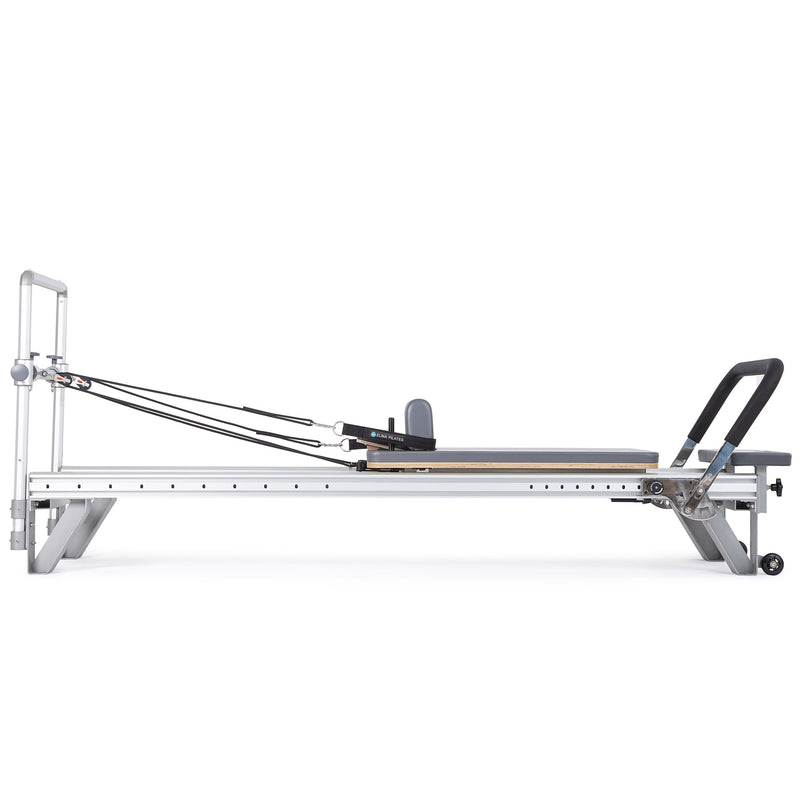Mentor Reformer side view, grey upholstery