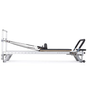 Mentor Reformer side view, black upholstery