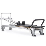 Elina Pilates Mentor Reformer in black, angled studio view