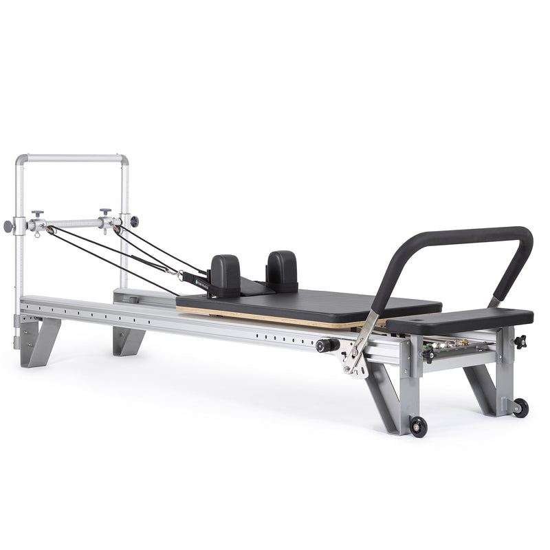 Elina Pilates Mentor Reformer in black, angled studio view