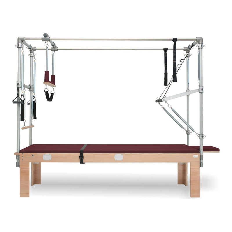 BASI Systems Cadillac Trapeze Table upholstered in Burgundy, the whole apparatus shown against a plain background
