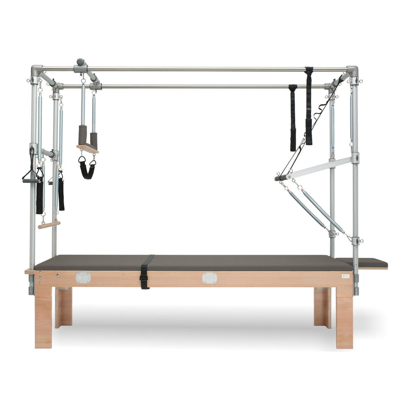 BASI Systems Cadillac Trapeze Table upholstered in Dark Cool Sand, the whole apparatus shown against a plain background
