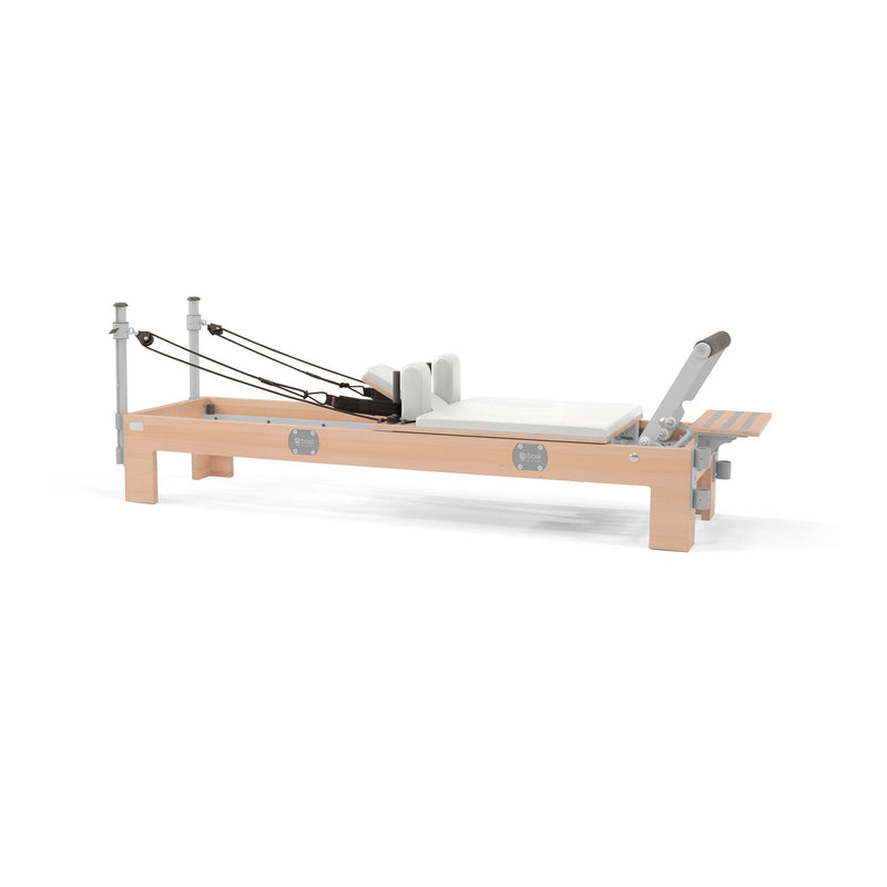 BASI Systems Compact Reformer upholstered in Pristine White, the whole apparatus shown against a plain background