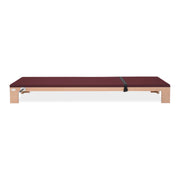 BASI Systems Raised Mat upholstered in Burgundy, the whole apparatus shown against a plain background