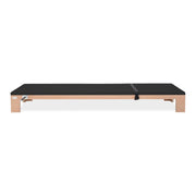 BASI Systems Raised Mat upholstered in Moonless Night Black, the whole apparatus shown against a plain background