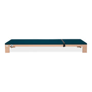 BASI Systems Raised Mat upholstered in Petrol Green, the whole apparatus shown against a plain background