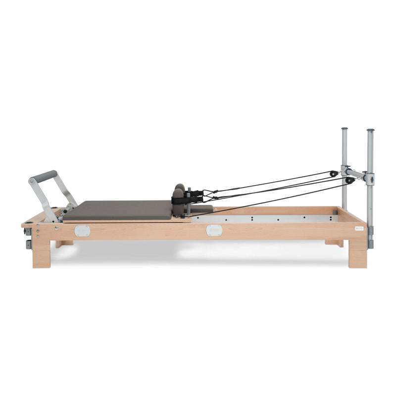 BASI Systems Reformer upholstered in Dark Cool Sand, the whole apparatus shown against a plain background, second view