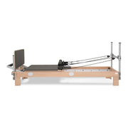 BASI Systems Reformer upholstered in Dark Cool Sand, the whole apparatus shown against a plain background, third view