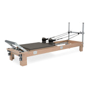 BASI Systems Reformer upholstered in Dark Cool Sand, the whole apparatus shown against a plain background