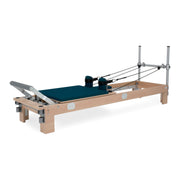BASI Systems Reformer upholstered in Petrol Green, the whole apparatus shown against a plain background