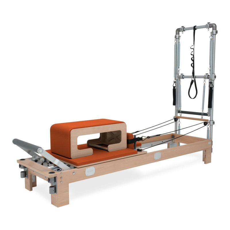 BASI Systems Reformer with Tower upholstered in Campfire Orange, the whole apparatus shown against a plain background, second view