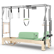 Elina Pilates Natural Wood Cadillac Reformer in mint green made-to-order upholstery