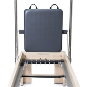 Elina Pilates Elite Cadillac Reformer jump board upright over the gear panel, grey