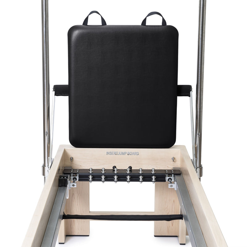Elina Pilates Elite Cadillac Reformer jump board upright over the gear panel, black