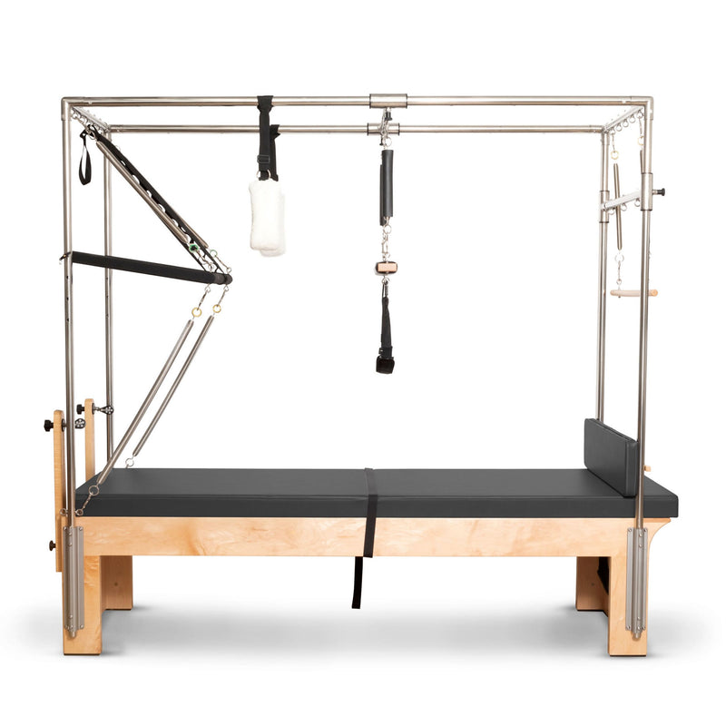 Elina Pilates Cadillac Reformer in grey, side view with the mats laid flat