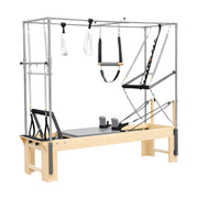 Elina Pilates Cadillac Reformer in grey, angled studio view