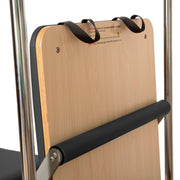 Elina Pilates Cadillac Reformer jump board and foot bar, black trim detail
