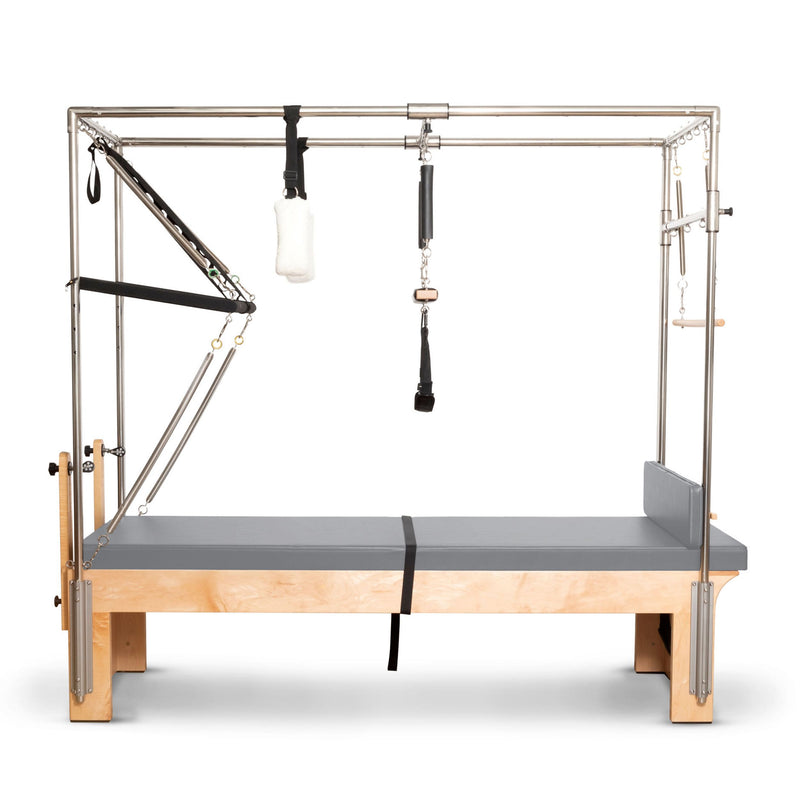 Elina Pilates Cadillac Reformer in grey, front view through the tower