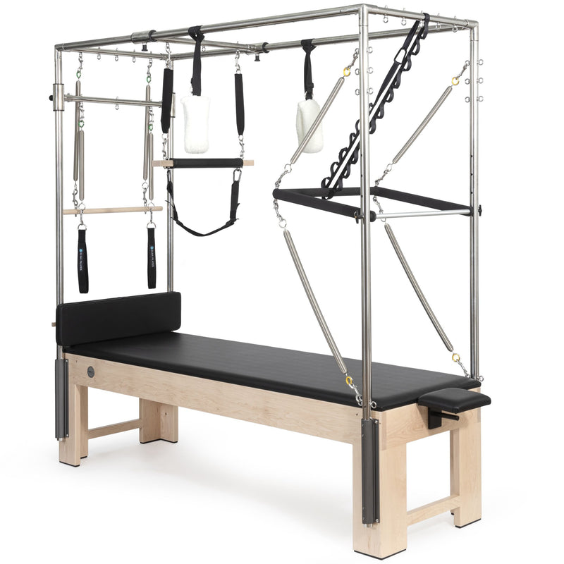 Elina Pilates Cadillac trapeze table in black, angled studio view