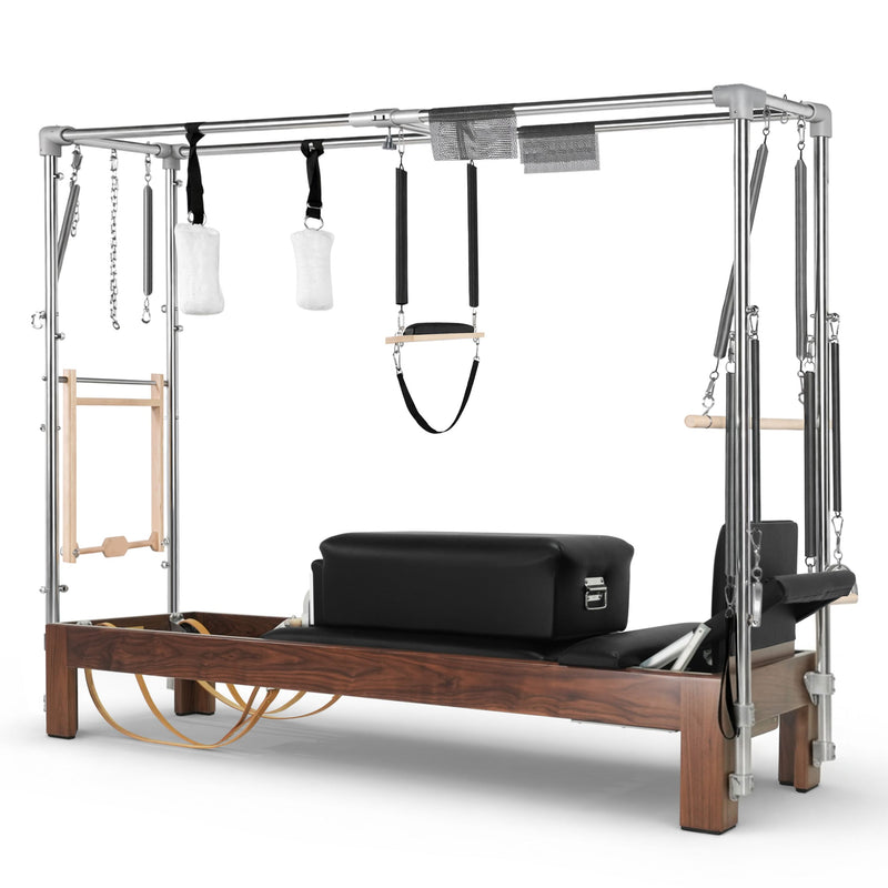 Elina Pilates Dark Wood Cadillac Reformer in black, 3/4 studio view