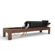 Classic Dark Wood Reformer front view with box on the carriage, black