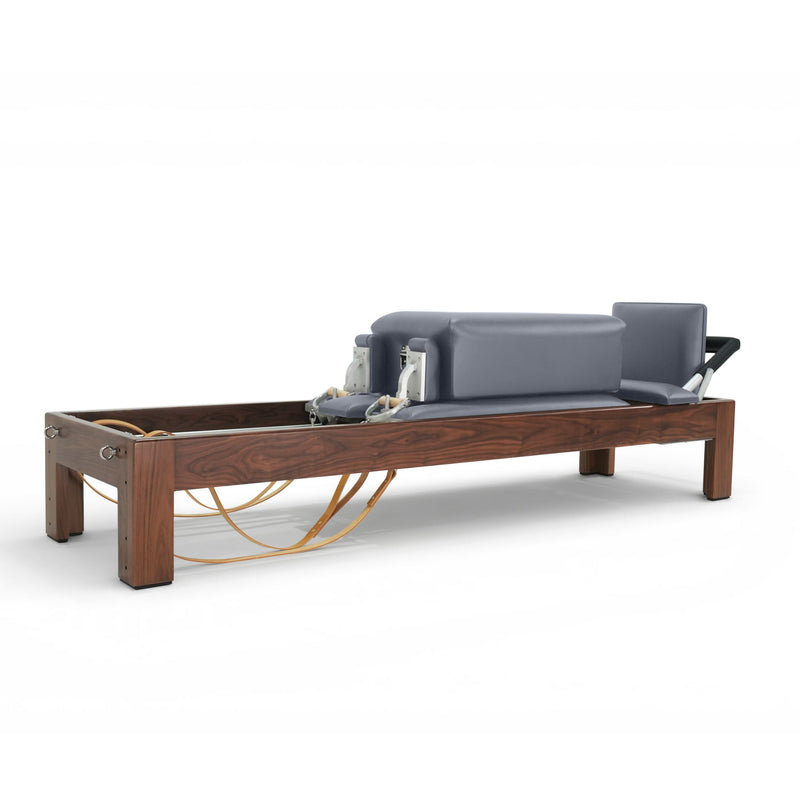 Classic Dark Wood Reformer front view with box on the carriage, grey