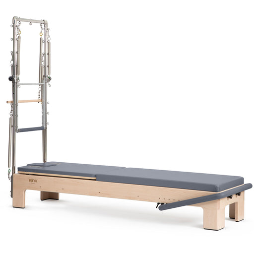 Elina Pilates Elite Advanced Reformer with Tower in grey, angled studio view