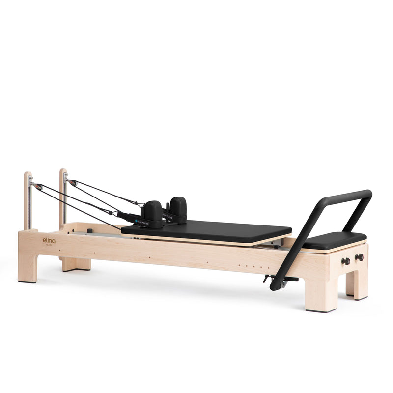 Elina Pilates Elite Advanced Reformer in black, angled studio view