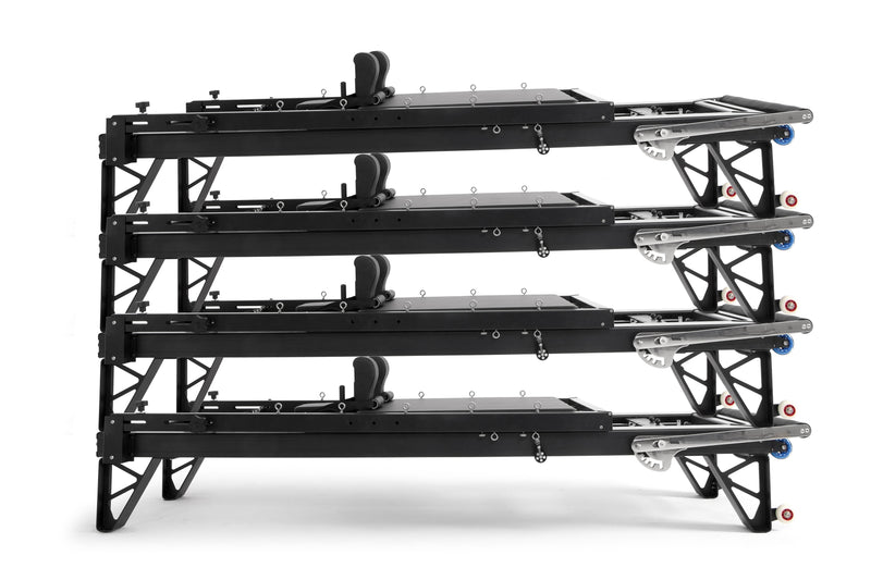Four Elina Pilates HL aluminium reformers stacked horizontally, front angle