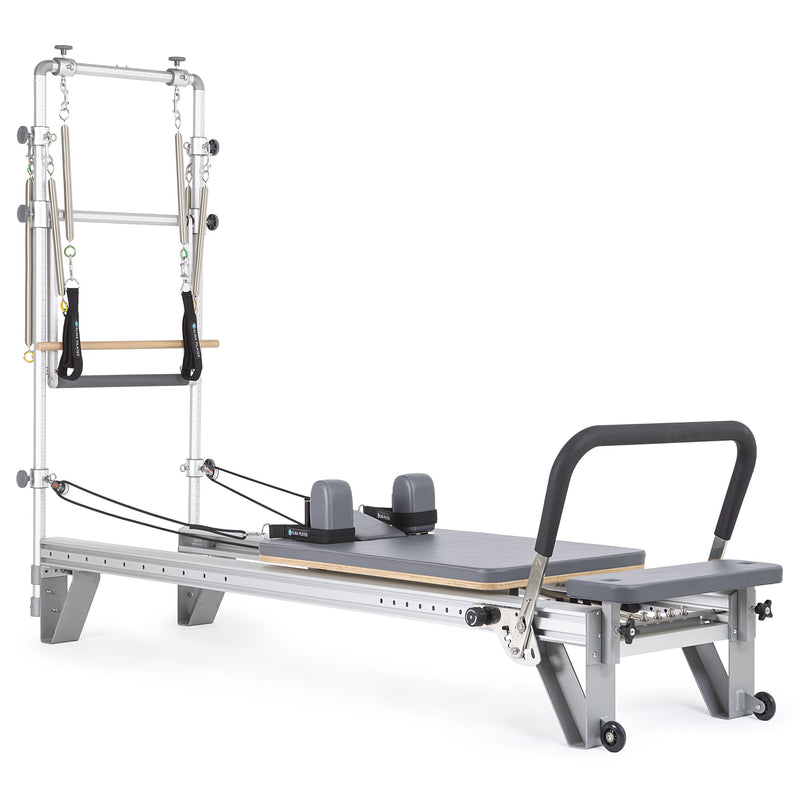 Elina Pilates Mentor Reformer with Tower in grey, angled studio view