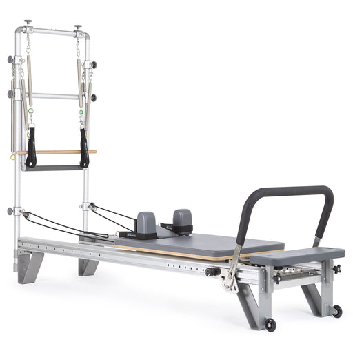 Elina Pilates Mentor Reformer with Tower in grey, angled studio view