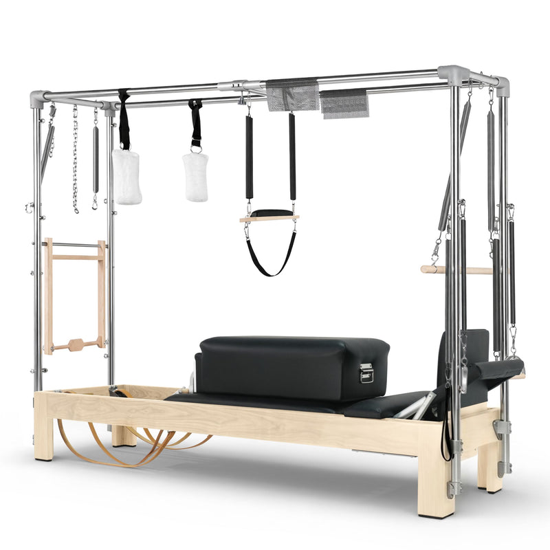 Elina Pilates Natural Wood Cadillac Reformer in black, 3/4 studio view