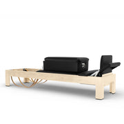 Classic Natural Wood Reformer rear view with box, black, alternate angle